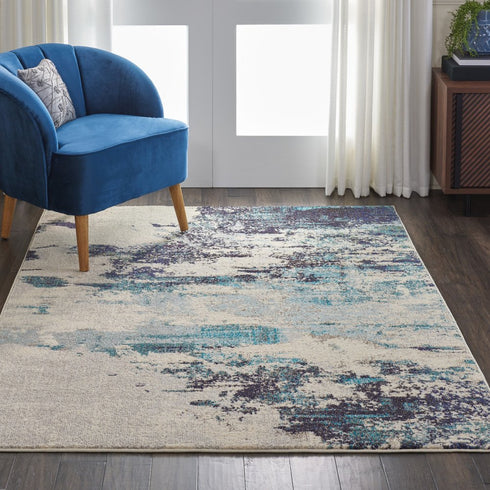 2' X 4' Ivory And Teal Blue Abstract Power Loom Non Skid Area Rug
